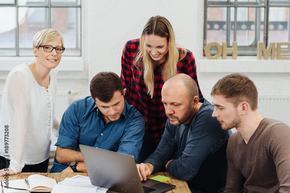 Fototapeta premium Manager or team leader with his young team