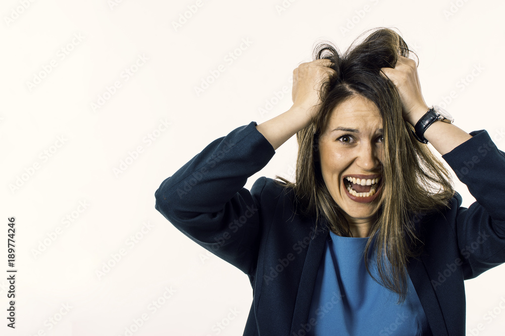 Screaming Woman is Going Crazy Pulling Her Hair. Stress Concept. Screaming Woman is Going Crazy Pulling Her Hair. Stress Concept.