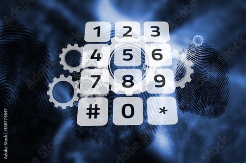 Keypad on digital cog and wheel background