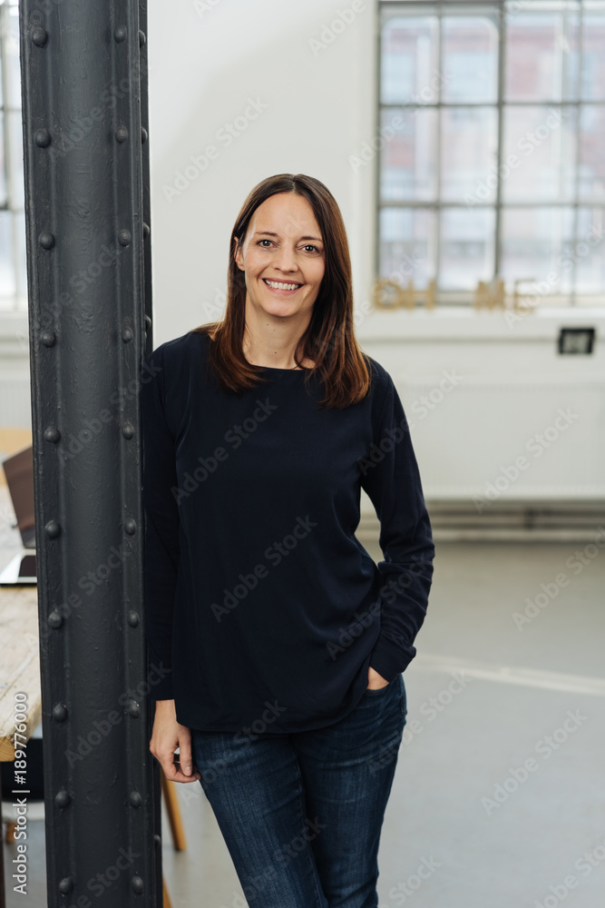 Relaxed smiling modern businesswoman