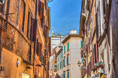 Narrow street under a clear sky