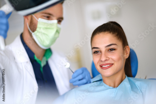 Young woman in dental ordination