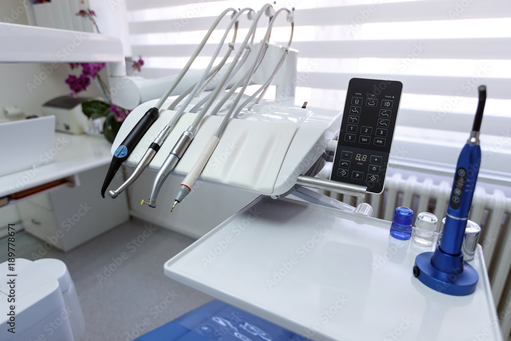 Dental apparatus for repairing teeth in dental ordination Stock Photo
