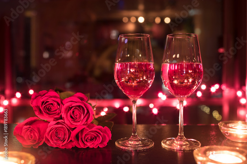 Wine and red roses. 