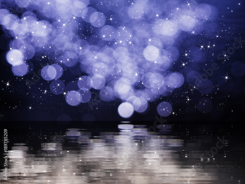 Φωτογραφία An abstract landscape with fuzziness and stars reflecting in a slightly undulati