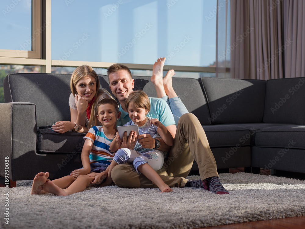 happy young couple spending time with kids happy young couple spending time with kids