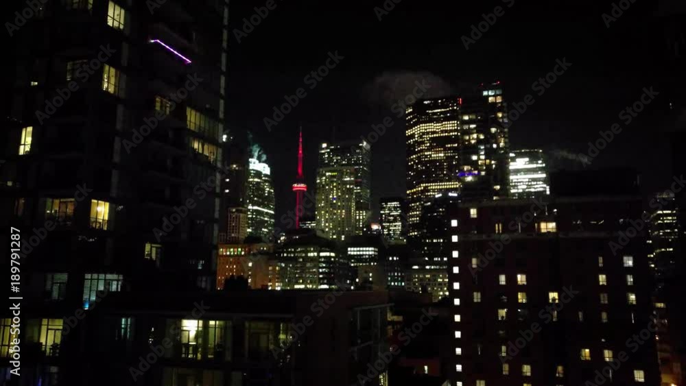 Grainy static shot of Downtown Toronto Skyscrapers at night in the winter, from east to west. Grainy static shot of Downtown Toronto Skyscrapers at night in the winter, from east to west.