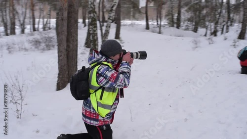 photographer takes pictures