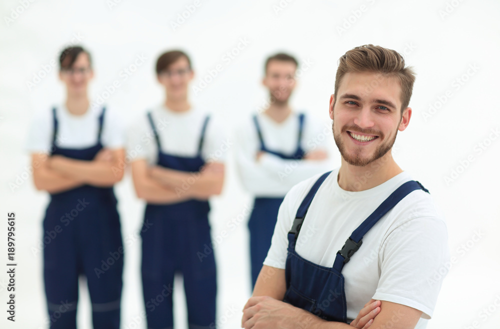 Cheerful team of responsible movers isolated on white background Cheerful team of responsible movers isolated on white background