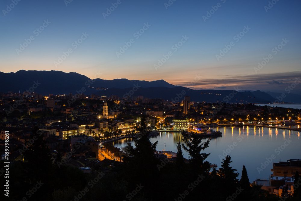 View of Split's historic Old Town and beyond from above in Croatia at dawn. Copy space.