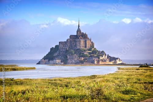 Wallpaper Mural Religious landmark of Mont Saint Michel from a distance, early morning, Normandy