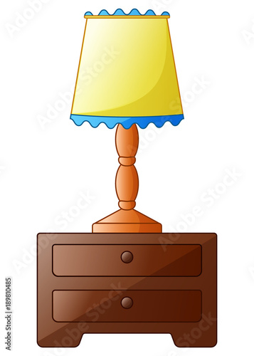 Wooden bedside table with lamp isolated on a white background