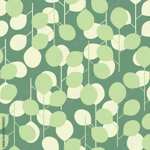 Seamless pattern of abstract leaves on a green background. Vector illustration