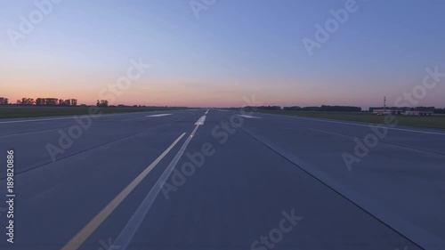 Airplane accelerates over the runway - POV