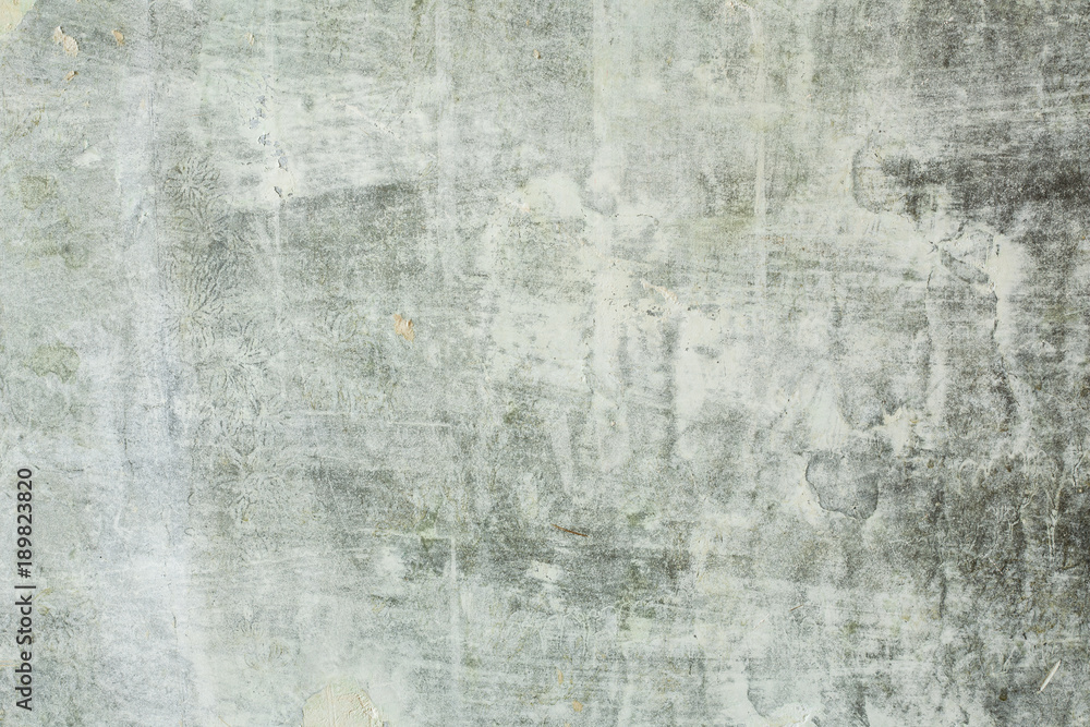 Old gray concrete wall with scuffs and putty green primer, texture background