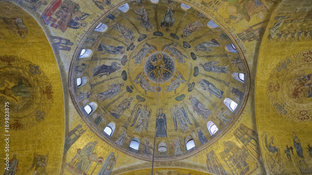 Religious mosaic painting on the dome of St. Marco Church internal, Venice Italy