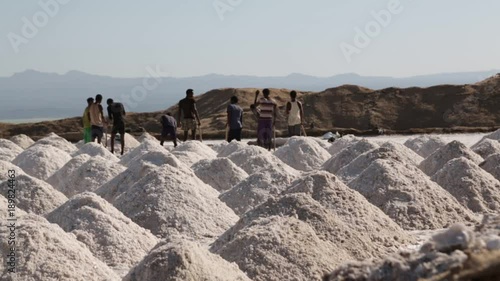 ETHIOPIA,LOMO-CIRCA  JANUARY 2018--unidentified people working in the salt industy
