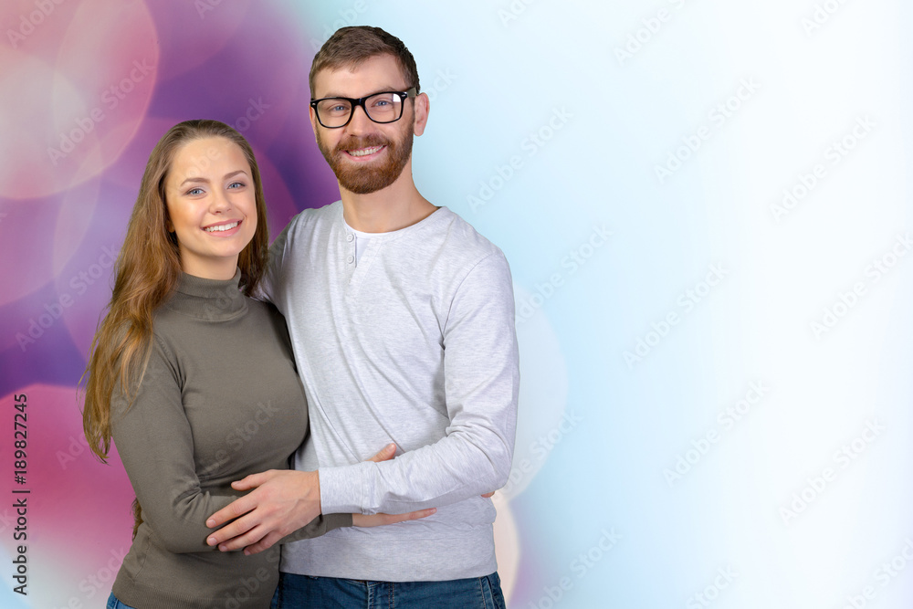 Cheerful young couple standing Cheerful young couple standing