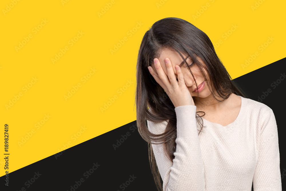 Portrait stressed sad young woman standing