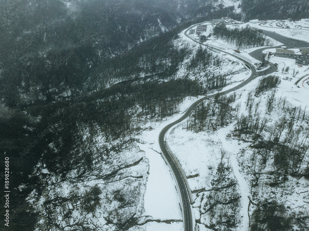 aerial view of the road on a winter snowy day