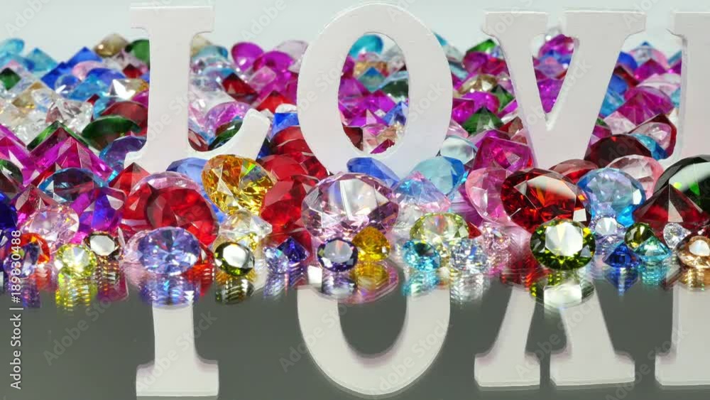 The white word love is located on the area of colorful diamonds and roses, the word love is love for Valentine's Day.
The white word love is located on the area of colorful diamonds and roses, the word love is love for Valentine's Day.