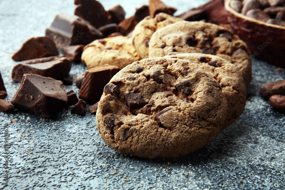 Fototapeta premium Chocolate cookies on grey table. Chocolate chip cookies shot