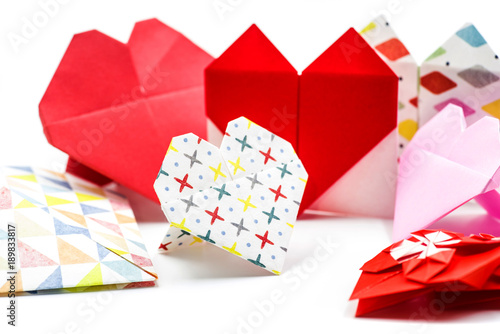set of hand made origamipaper hearts isolated on white background