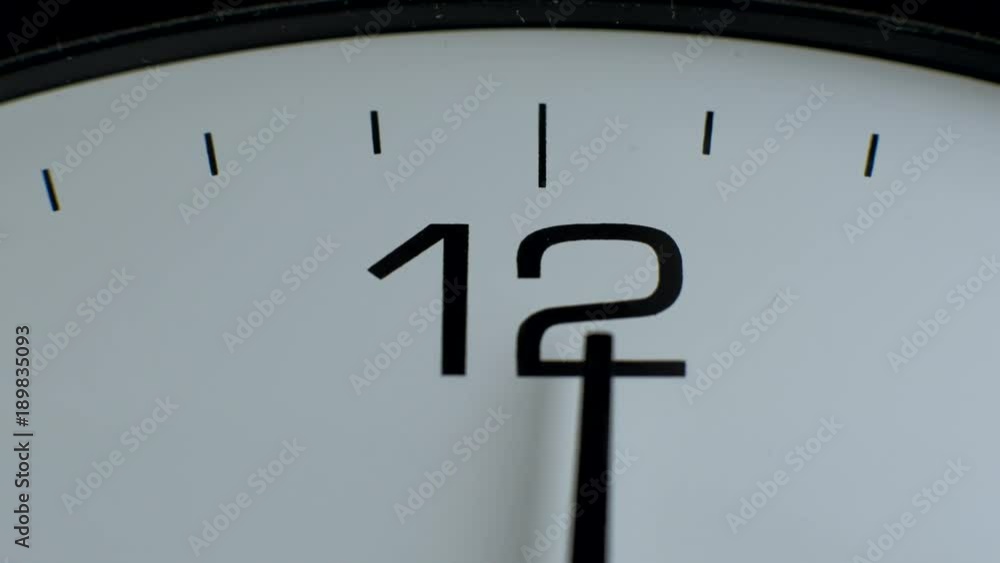 Close up- office clock timelapse. White wall clocks running. The movement of clock hands. Arrow 12 hours. Time for lunch Close up- office clock timelapse. White wall clocks running. The movement of clock hands. Arrow 12 hours. Time for lunch