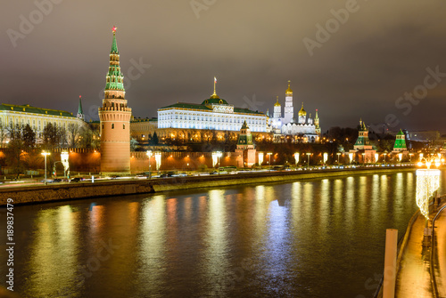 Illuminated Moscow Kremlin and Moscow river in winter evening, Russia