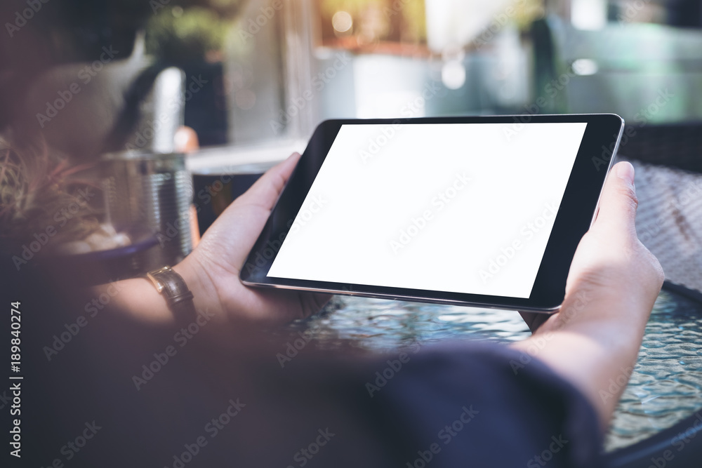 Mockup Image Of Hands Holding Black Tablet Pc With Blank White Desktop Screen And Coffee Cup On Glass Table Stock Photo Adobe Stock Mockup Image Of Hands Holding Black Tablet Pc With Blank White Desktop Screen And Coffee Cup On Glass Table Stock Photo Adobe Stock