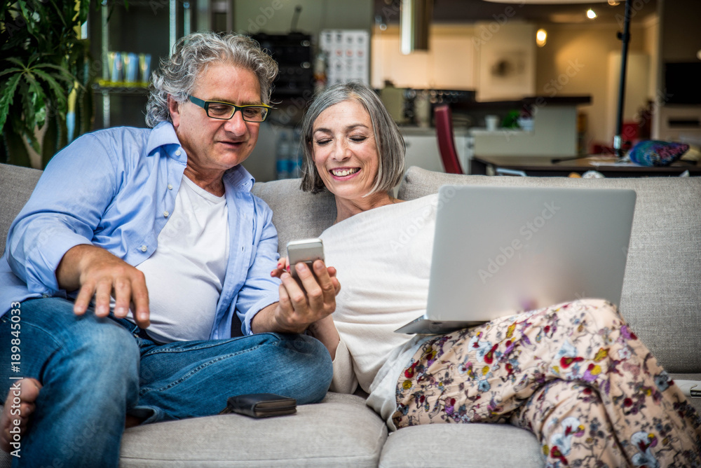Senior couple shopping online Senior couple shopping online
