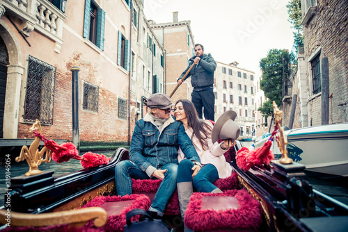 Couple sailing on venetian gondola