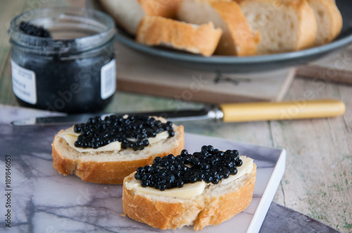 Sandwiches with black caviar