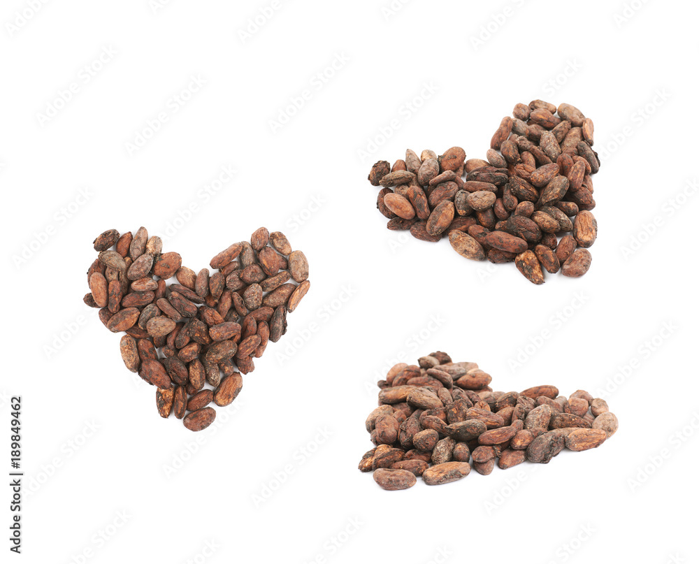 Heart shape made of cocoa beans isolated