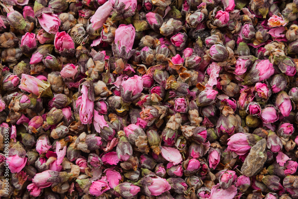 Tea flowers texture. Peach blossom tea. Organic dried flower tea leaves.