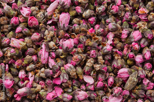 Tea flowers texture. Peach blossom tea. Organic dried flower tea leaves. © Nova Stocks