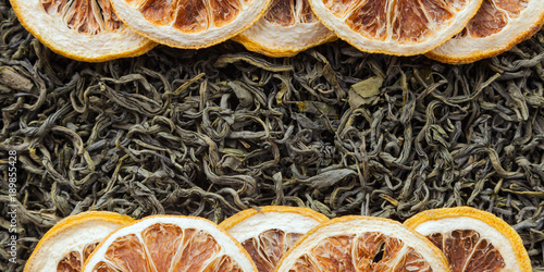 Tea herbs texture. Green tea background. Organic dried green tea leaves. photo