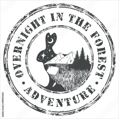 Retro printing. A wiped seal with wild animals. Journey to the mountains. The mountain range. Fox, bear, deer and hare with a stylized view of nature.