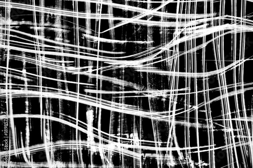 Black and white creative background. Abstract curved white lines and spots on black. Design element of interior or other ideas.
