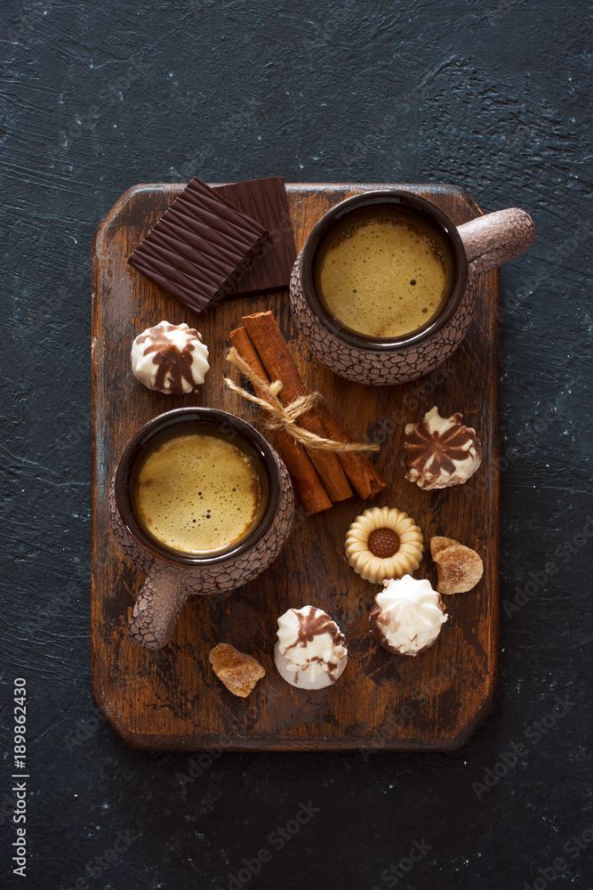 Cups of coffee and sweets Cups of coffee and sweets