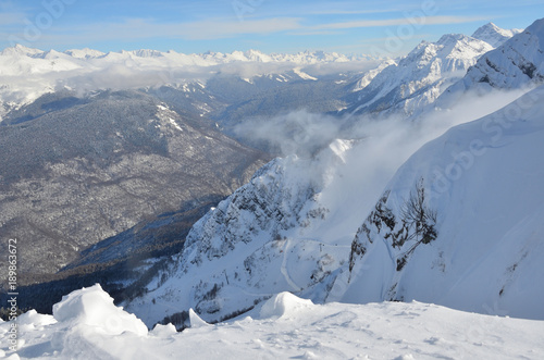 Sochi, Russia, the Caucasus mountains, a dense layer of clouds over the Rosa valley. Look from Rosa Peak