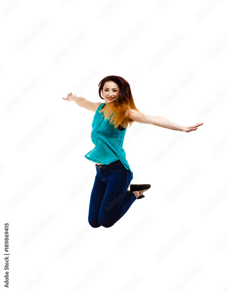Young woman jumping on white background Young woman jumping on white background