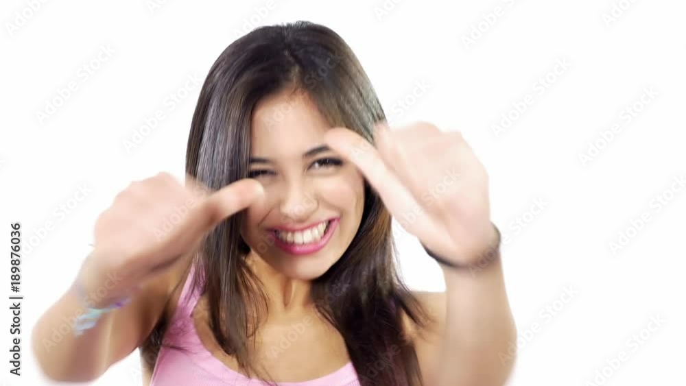 Cute happy hispanic girl thumbs up smiling Cute happy hispanic girl thumbs up smiling