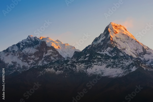 Annapurna I, or Main, and Annapurna South, mountain view from famous Poon Hill viewpoint on sunrise. Nepal landscape, Annapurna circuit, Himalaya Range, Asia. Horizontal view