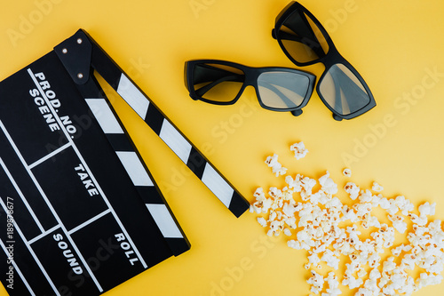 Cinema minimal concept. Watching film in the cinema. 3d glasses, popcorn, cla...
