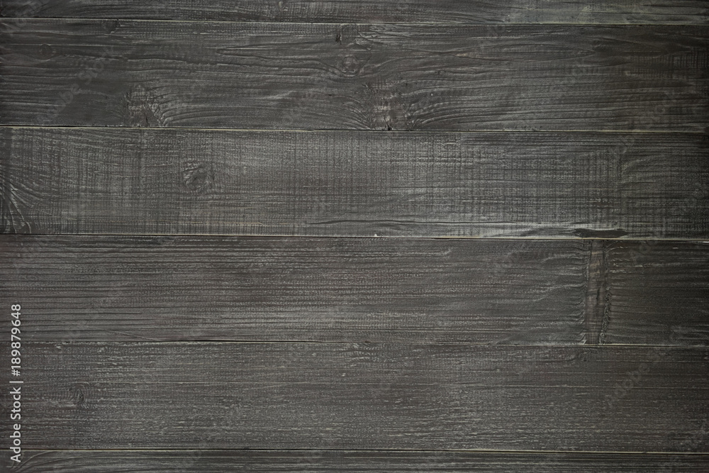 Obraz premium Dark brown wooden table background texture