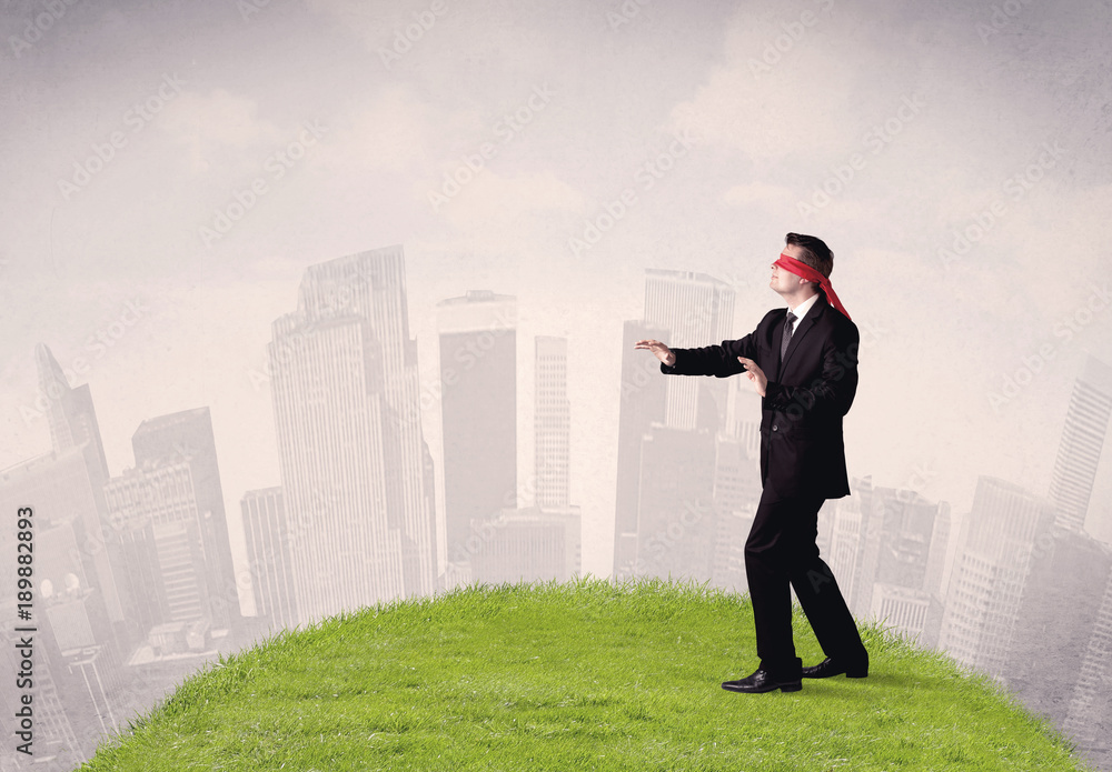 Blindfolded businessman concept Blindfolded businessman concept