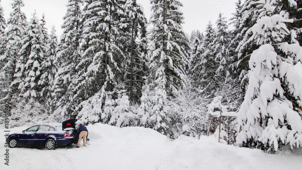 Winter Landscape Man Loading In A Car In The Mountains Winter Landscape Man Loading In A Car In The Mountains