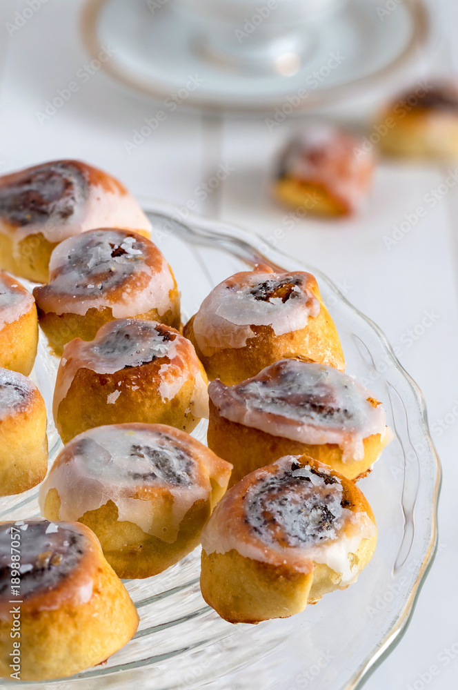 Poppy seed cakes. Mini rolls with poppy seed and icing sugar. Poppy seed cakes. Mini rolls with poppy seed and icing sugar.