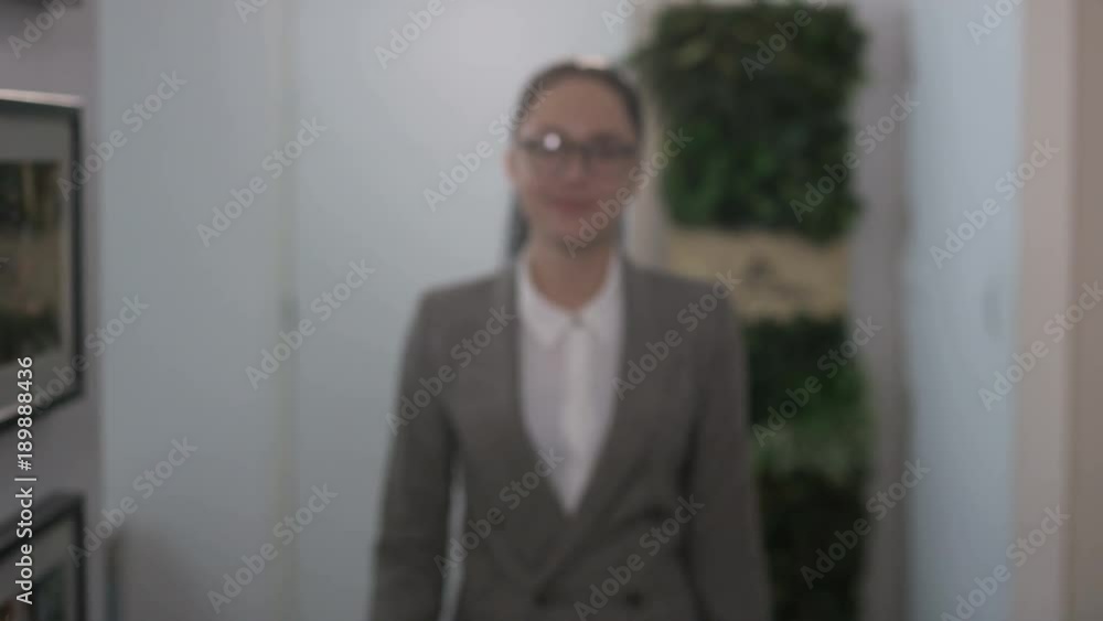 Young Businesswoman Walking Close to the Camera Young Businesswoman Walking Close to the Camera